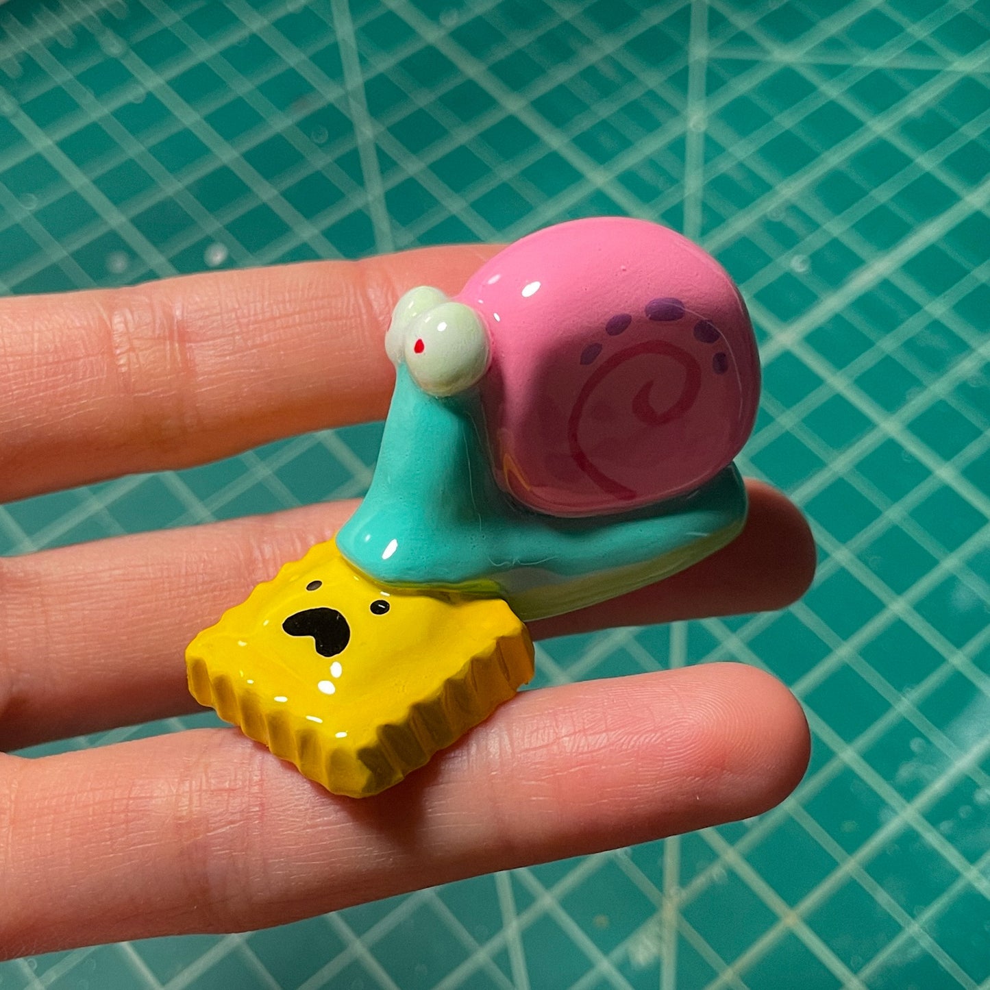 Snail with Ravioli Figurine