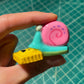 Snail with Ravioli Figurine